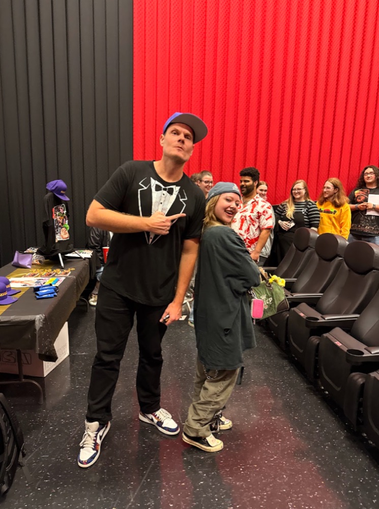 Students with Skweezy Jibbs at a campus screening meet & greet