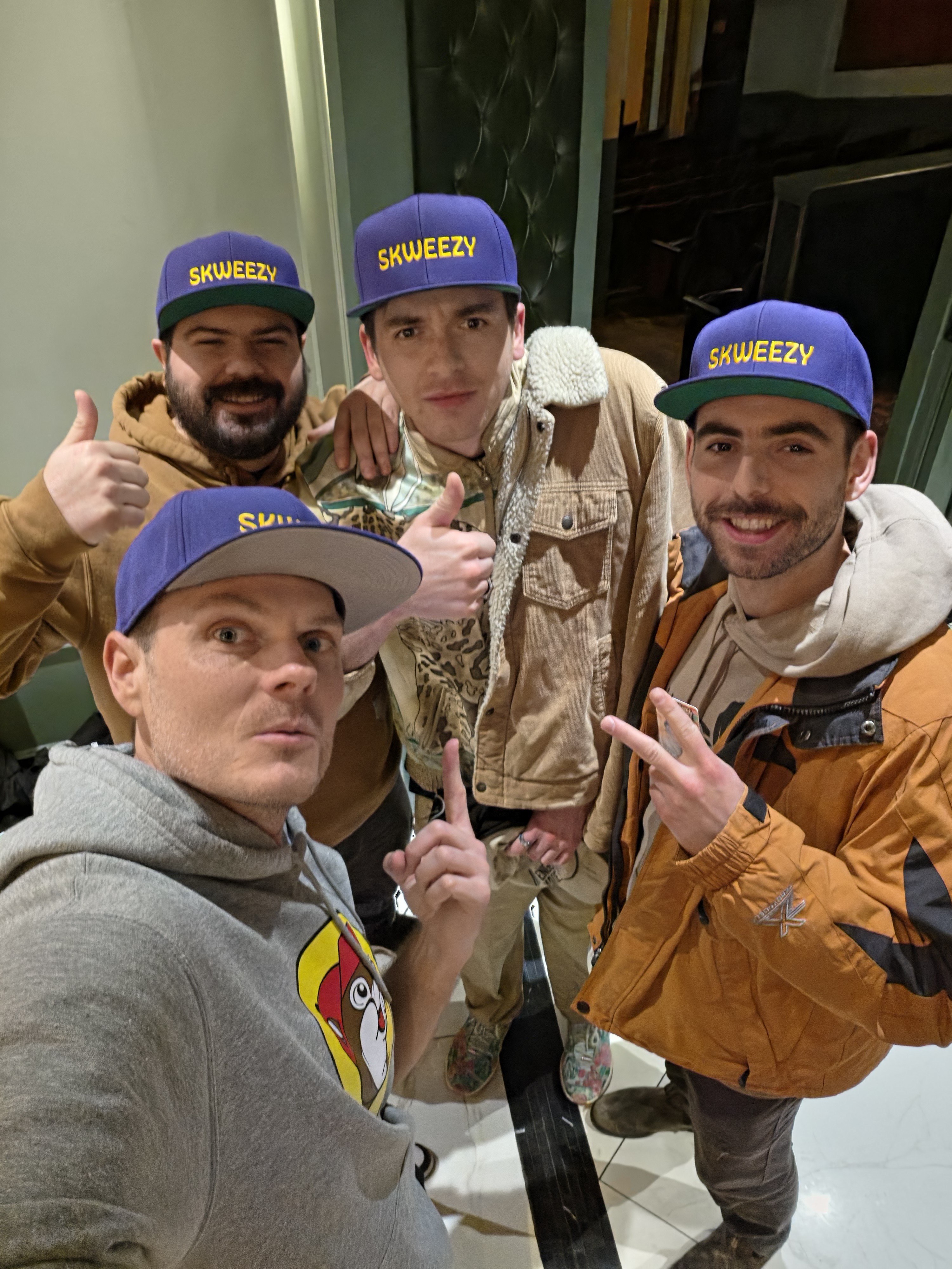 fans wearing Skweezy merch at the show