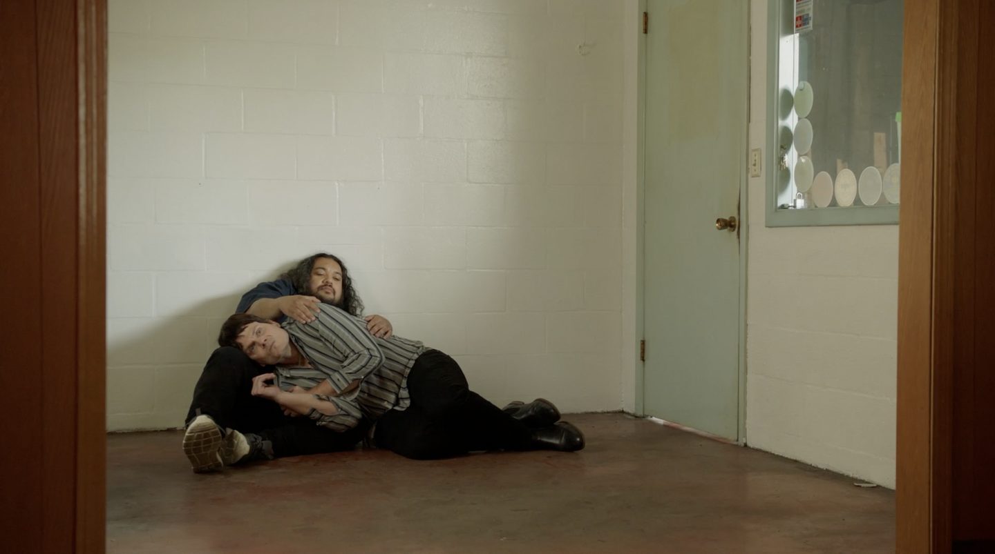Adam comforts Skweezy during a panic attack